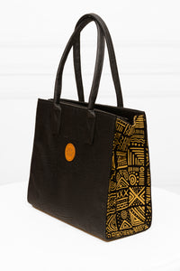 Handmade Black Soft Leather and Ankara/ African print mid-sized handbag.